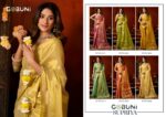Gobuni Supriya heavy tissue saree with gold cow butta design and fancy tassels.