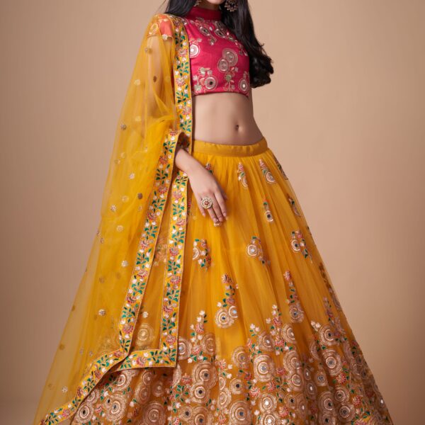 Mustard yellow and rani pink mirror work designer lehenga choli