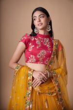 Front view of mirror work embroidered designer lehenga choli
