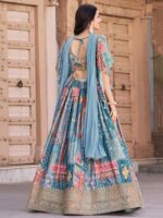 Sky blue designer blouse with embroidered detailing and tie-up back
